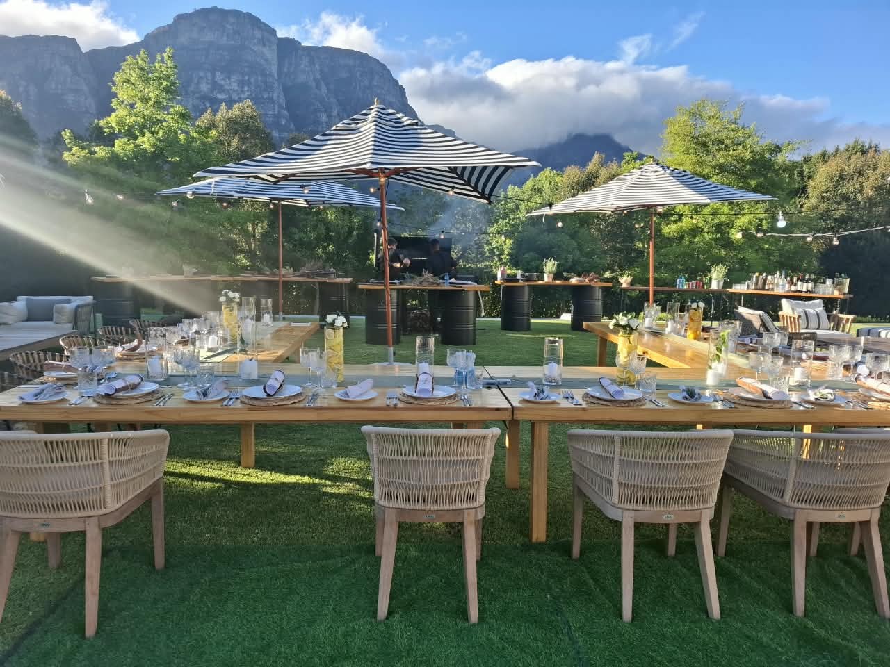 Outdoor dining beneath umbrellas