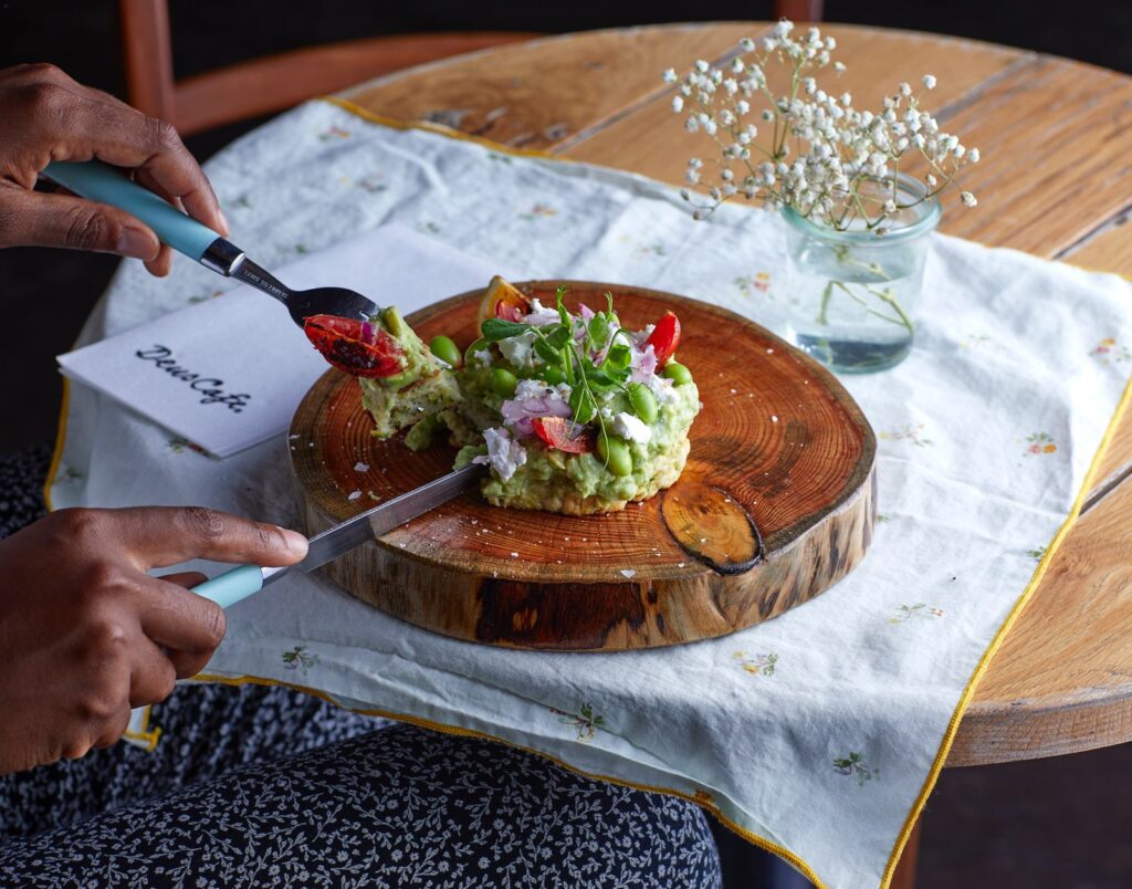 smashed avo on zucchini fritter — staging demonstration